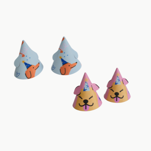 Four party hats with cartoon dog faces wearing party hats—two blue hats and two pink-yellow hats on a white background.